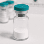 Vial with white peptide powder for research and laboratory use. High-quality peptides for scientific.