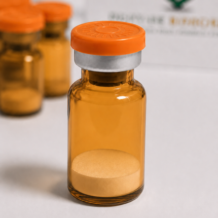 Amber glass vial with orange cap containing peptide powder for scientific use.