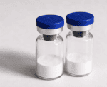 Two glass vials with white powder and blue caps for peptide research.