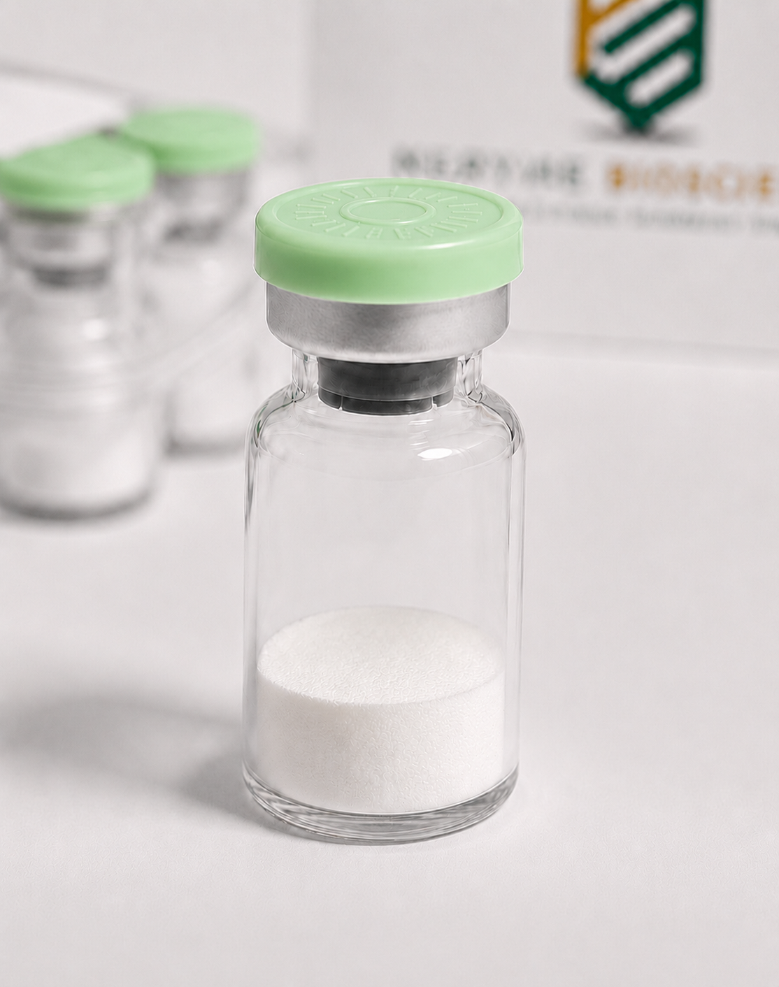 Peptide Bioscience Laboratory Sample Vial of white peptide powder with green cap for peptide synthesis.