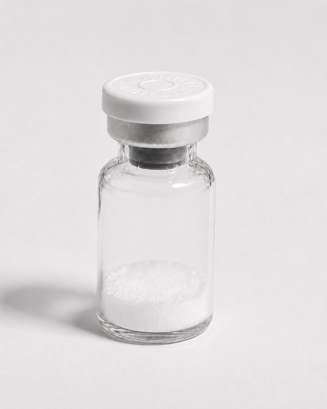 Peptide Bioscience Laboratory Vial Clear glass vial with white cap containing white powder for peptide synthesis.
